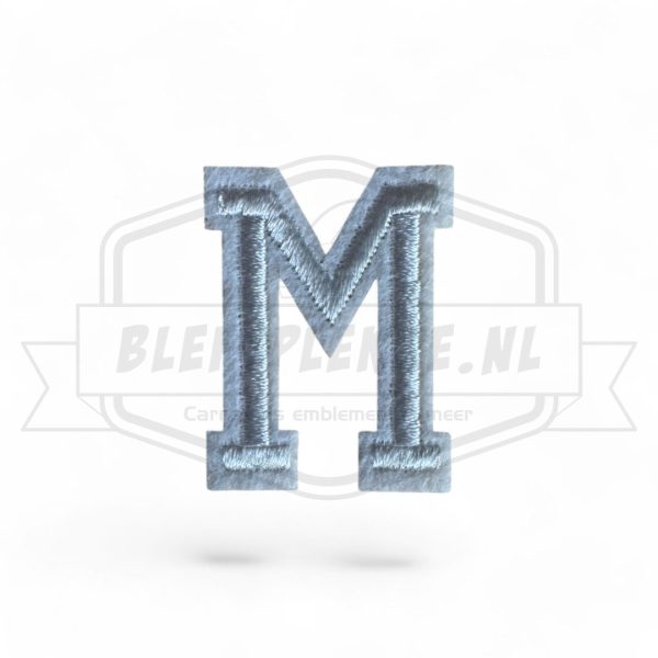 Letter M - Embleem Alphabet Wit