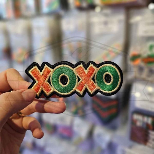 Embleem XOXO Groen/Oranje